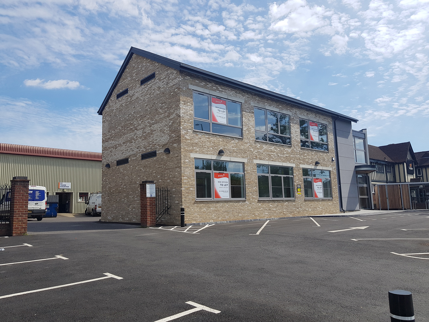 New car park, kerbs and lining outside commercial units at Chandlers Ford